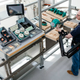 Illustration for article titled This Exoskeleton Rig Makes Factory Workers 10 Times Stronger
